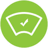 Green circle with a white checkmark inside a stylized dashboard icon, symbolizing verification or approval.